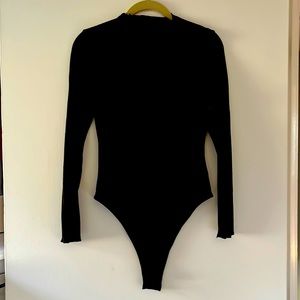 Mock neck body suit, black, ribbed. Size small